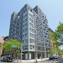 砖砌建筑前身是Robert Marino和Leehong Kim设计的细长的East Harlem住宅楼
