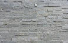 由Haptic设计的伦敦切尔西当代住房开发的预制外墙是预制的石材和浅砖砌面板